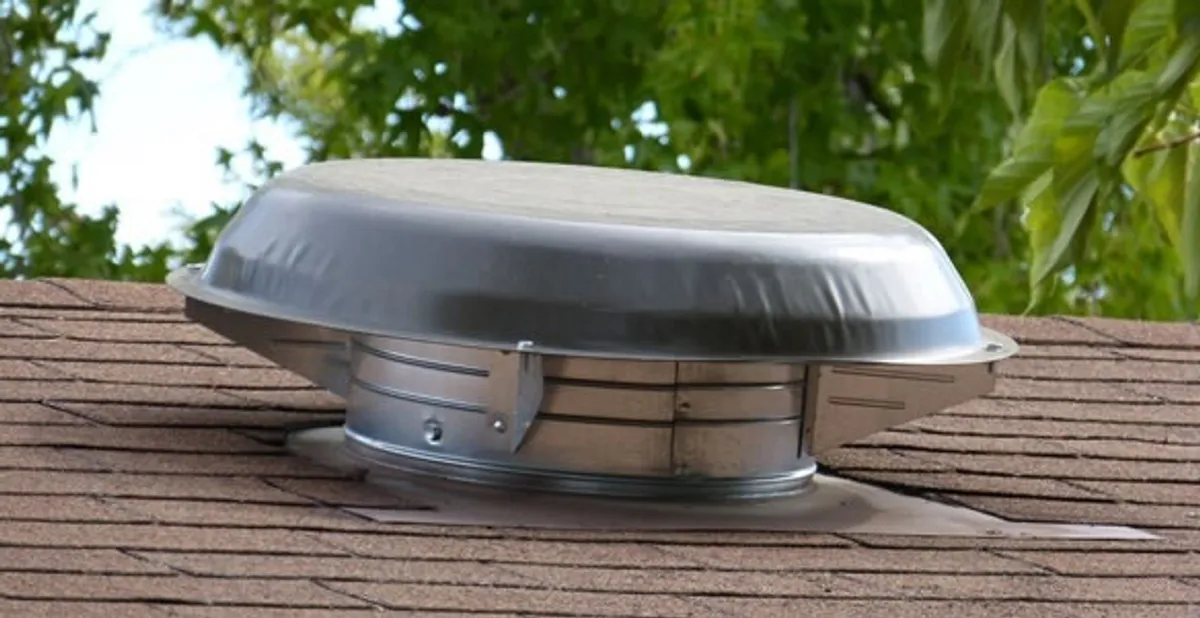 attic fan installation services with low-profile roof ventilation unit in Bellevue, NE