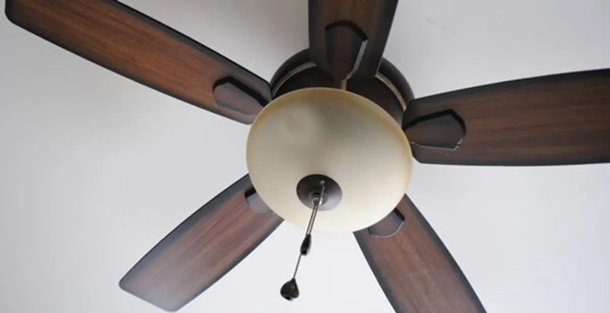 Fully installed ceiling fan with balanced blades and light fixture in Bellevue, NE