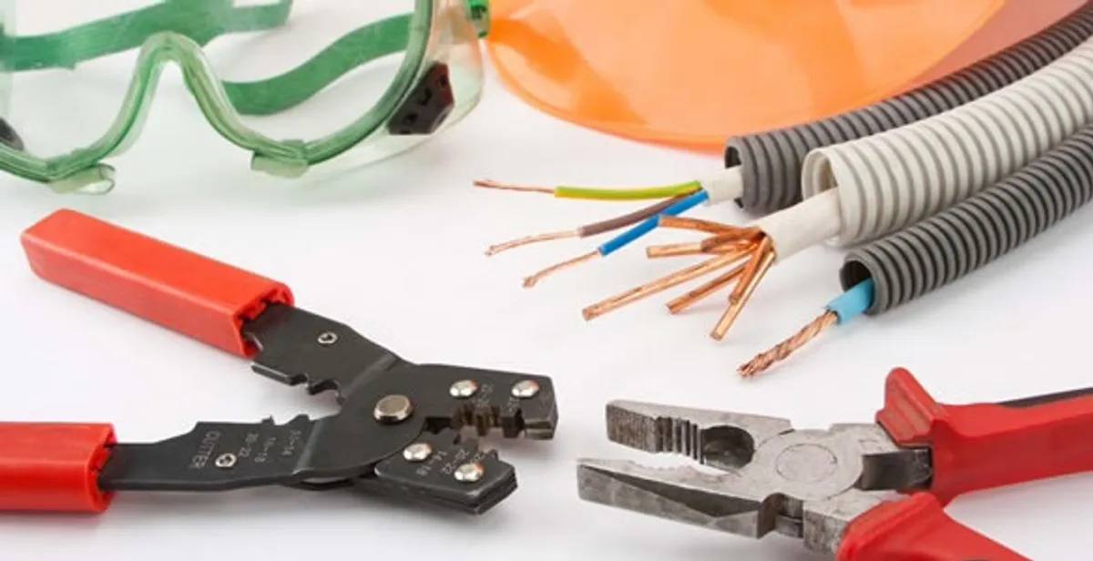 Electrical wiring repair with professional tools and safety equipment in Plattsmouth, NE
