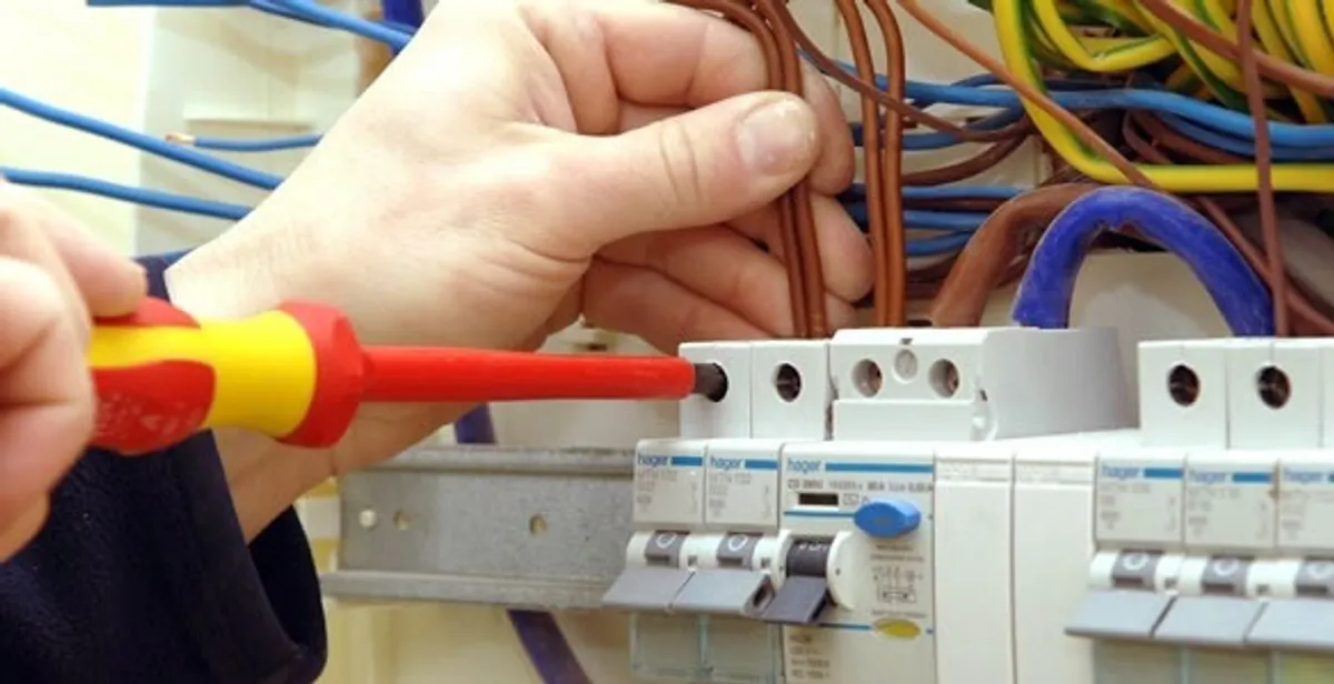 electrician services performing professional electrical panel wiring and connections in Bellevue, NE